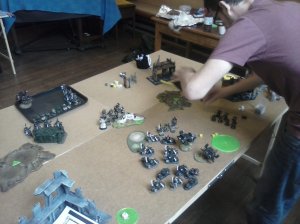  Lord Morrow begins to beat the veterans with the fabled Black Mace while the Havocs blow the assault cannons off the landraider. 